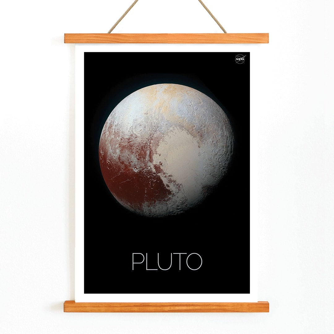 Pluto by NASA black framed poster featuring detailed surface textures, with wooden magnetic frame on white background
