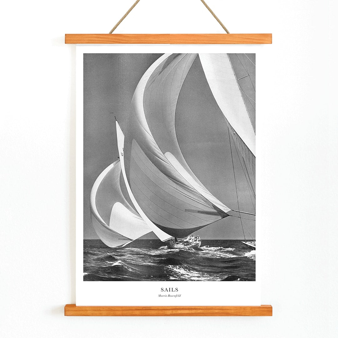 Sailing yacht with billowing sails on the open ocean by Morris Rosenfeld titled Sails poster artwork, with wooden magnetic frame on white background