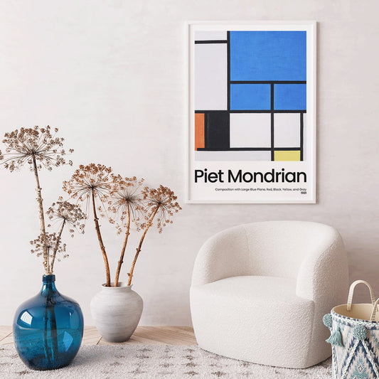 Abstract geometric painting and poster featuring Composition with Large Blue Plane Red Black Yellow and Gray by Piet Mondrian, framed and displayed in home decor