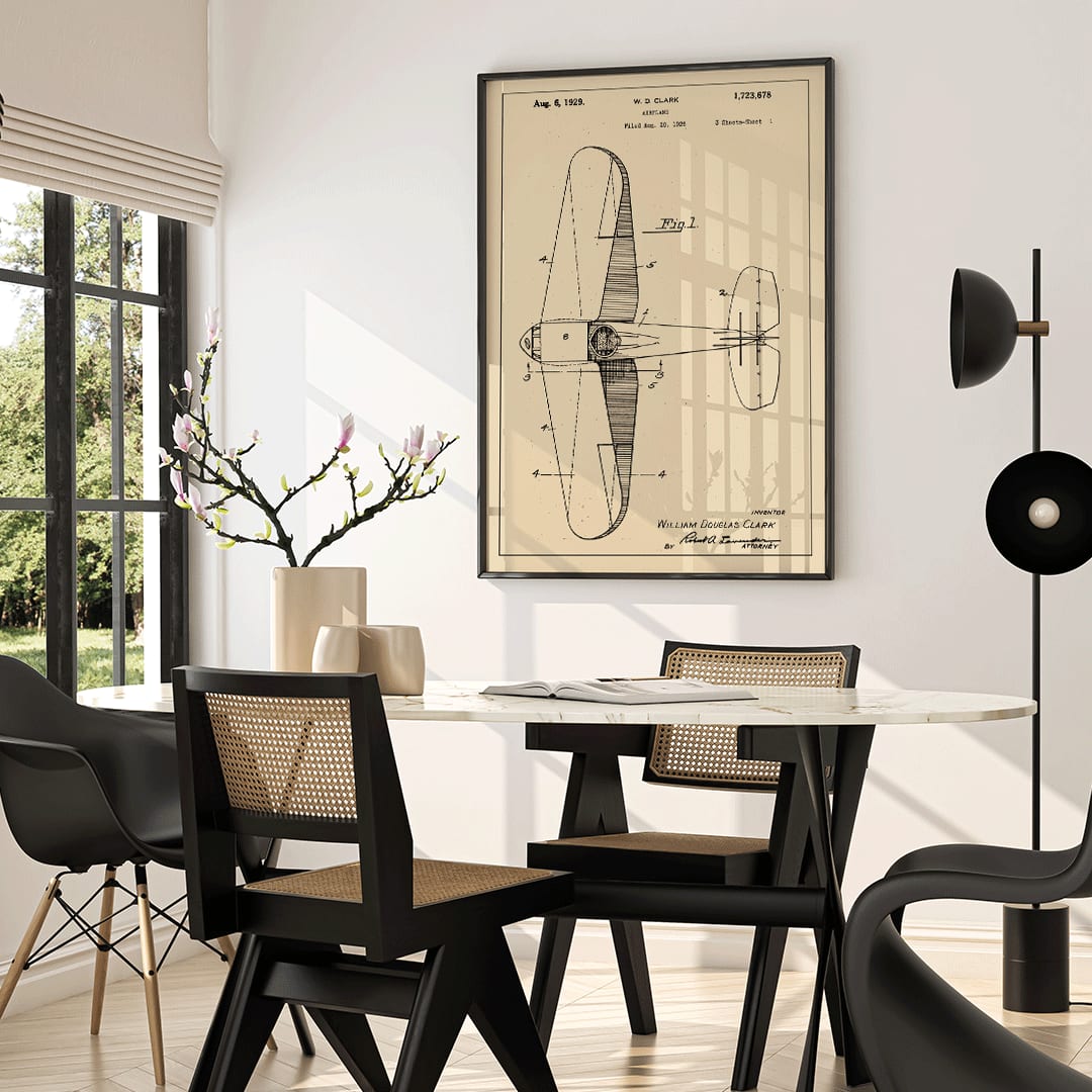 Airplane patent design drawing and detailed blueprint poster by WD Clark with annotated parts and technical specifications, framed and displayed in home decor