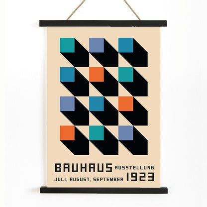 Bauhaus Poster inspired by the Weimar Exhibition with geometric patterns bold colors by Joost Schmidt in black blue orange and teal squares, with wooden magnetic frame on white background