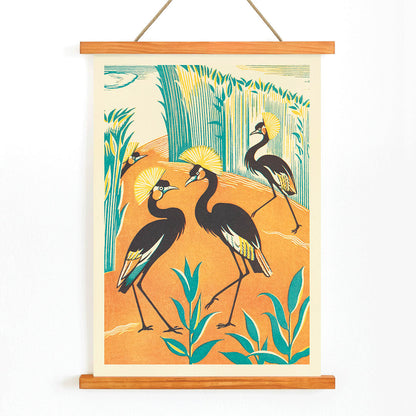 Colorful exotic birds and stylized plants in a jungle setting by Clifford Webb from A Jungle Picnic Pl15 poster with orange and green background, with wooden magnetic frame on white background