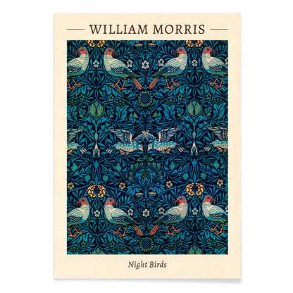 Night Birds by William Morris colorful patterned illustration and poster with intricate birds and floral designs in rich blue and green tones, with black aluminium frame on white background