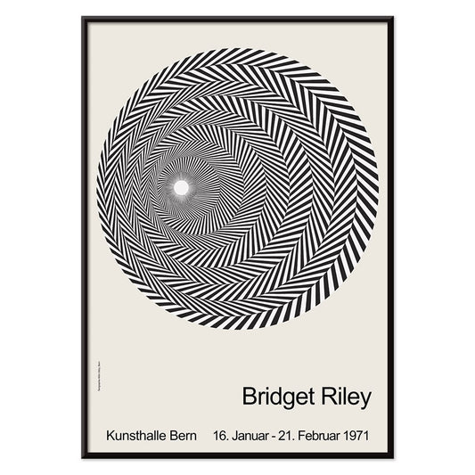 Bridget Riley Blaze Exhibition Poster featuring hypnotic black and white spiral geometric design on light background, with black aluminium frame on white background