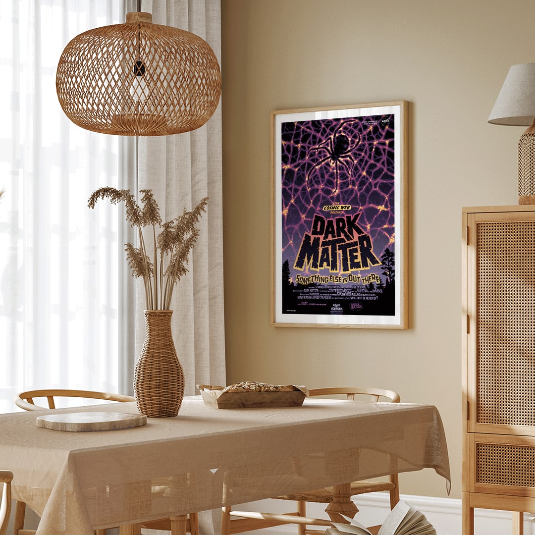 NASA Dark Matter poster featuring a cosmic web and spider silhouette with vibrant colors and text reading Dark Matter Something Else is Out There, framed and displayed in home decor