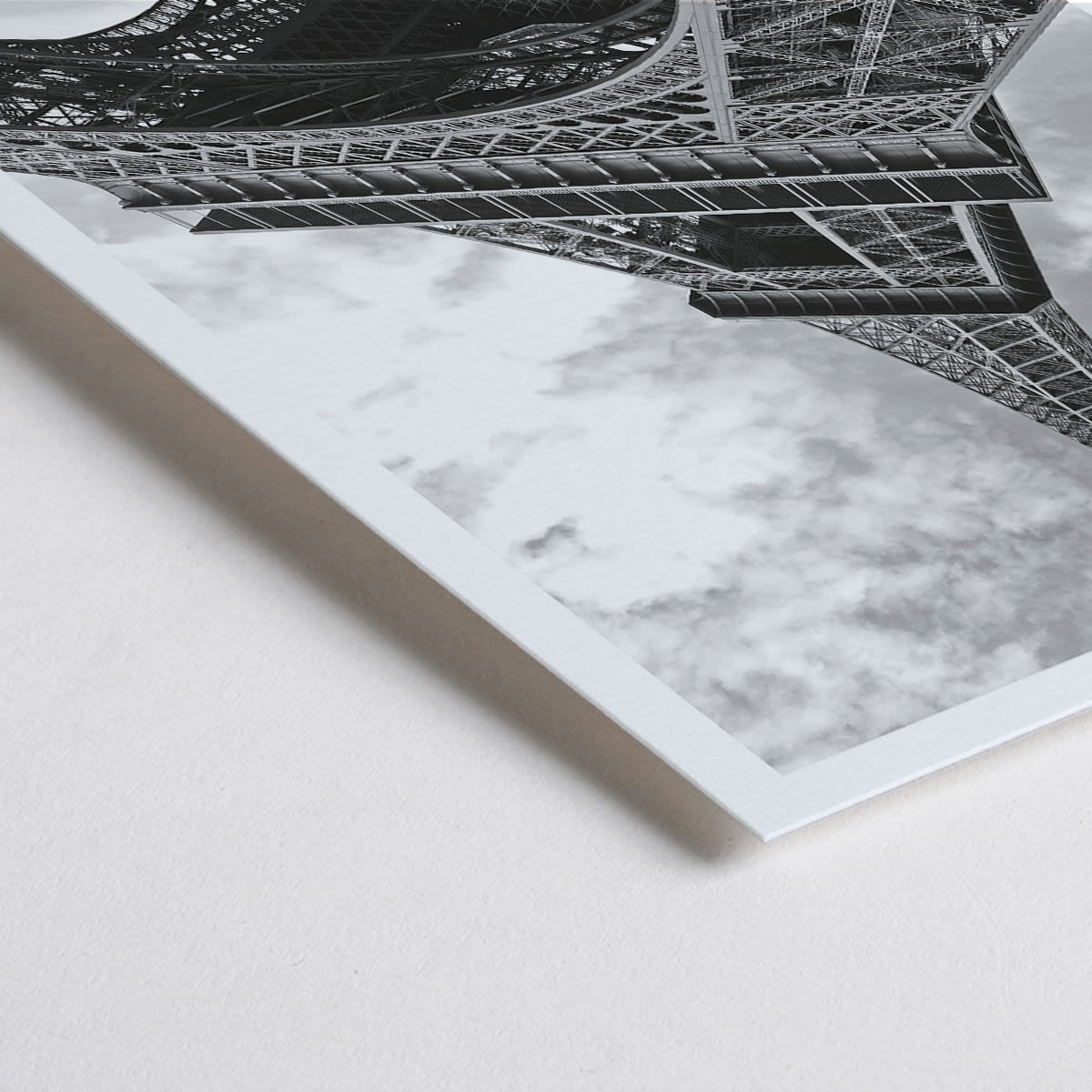 Closeup detail of Black and white picture of the Eiffel Tower in Paris featuring its intricate structure by artist poster titled Tour Eiffel Black and White
