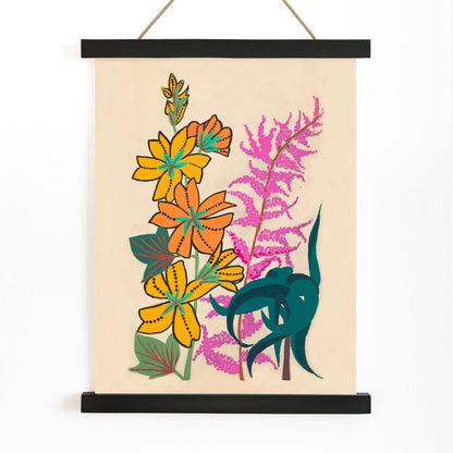 Colorful floral illustration of branches and leaves by Atelier Martine featuring vibrant orange yellow and pink flowers poster artwork, with wooden magnetic frame on white background