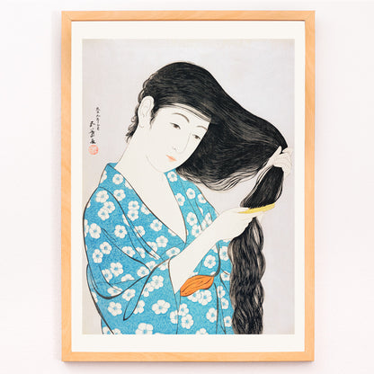 Closeup detail of Woman in blue floral kimono combing her long hair artwork Woman Combing Her Hair by Goyo Hashiguchi Japanese art poster