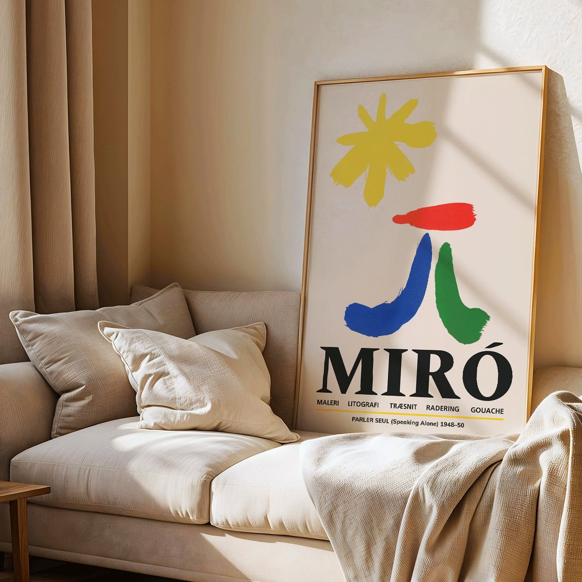 Parler Seul exhibition poster by Joan Miro with abstract colorful shapes on a light background, framed and displayed in modern living room decor