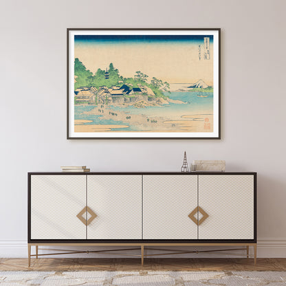 Coastal village with houses trees ocean and Mount Fuji by Katsushika Hokusai Enoshima in Sagami Province Japanese artwork, framed and displayed in home decor