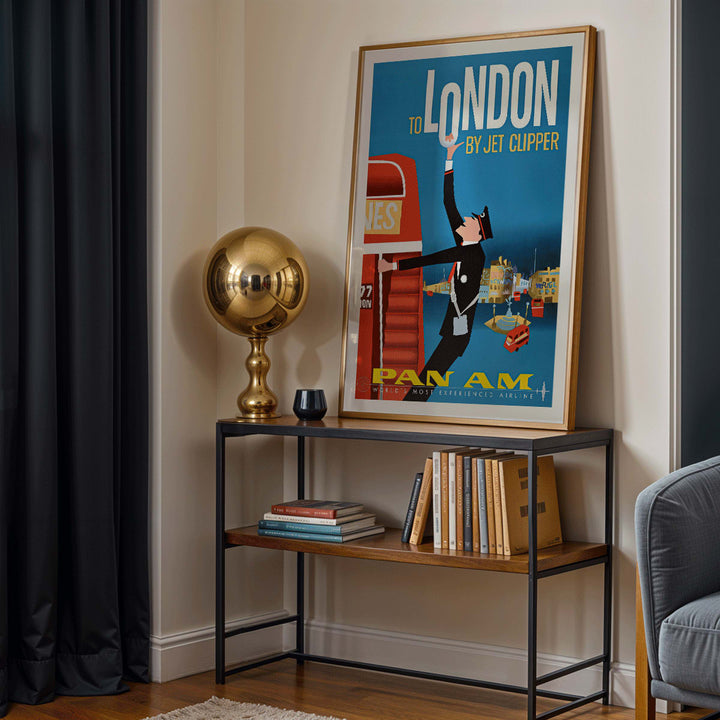 Vintage Pan Am Airlines poster artwork featuring a flight attendant and double decker bus promoting travel to London by Jet Clipper, framed and displayed in home decor