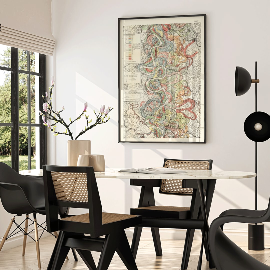 Colorful poster map of the Mississippi River by Harold Fisk titled Alluvial Valley of the Mississippi River showing historical meanders and vibrant river patterns, framed and displayed in home decor