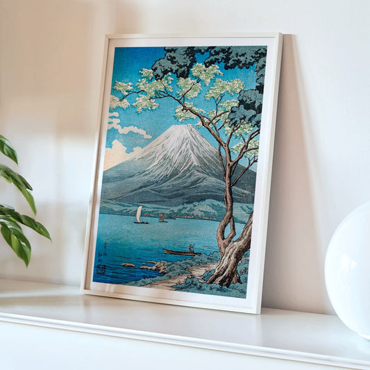 Mount Fuji from Lake Yamanaka by Hiroaki Takahashi with sailboats blue water and a tree in the foreground Japanese artwork poster, framed and displayed in home decor