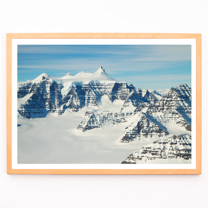 Closeup detail of Snow covered mountain ridges and unique geology of the Geikie Plateau eastern Greenland by NASA poster