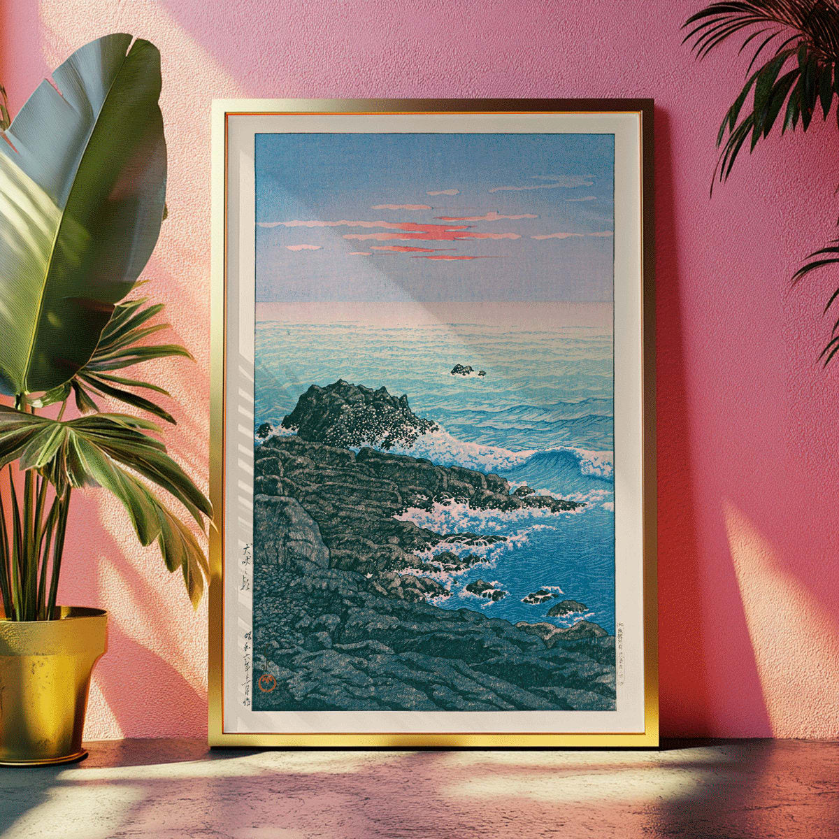 Morning at Cape Inubo by Kawase Hasui seascape with waves crashing on rocky shore at sunrise coastal scene poster, framed and displayed in modern living room decor