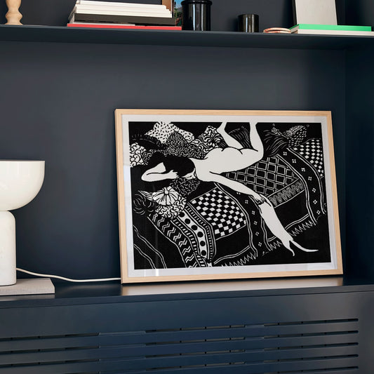 La Paresse by Felix Emile-Jean Vallotton painting of a woman reclining on a patterned bed with a cat stretching beside her art poster, framed and displayed in home decor