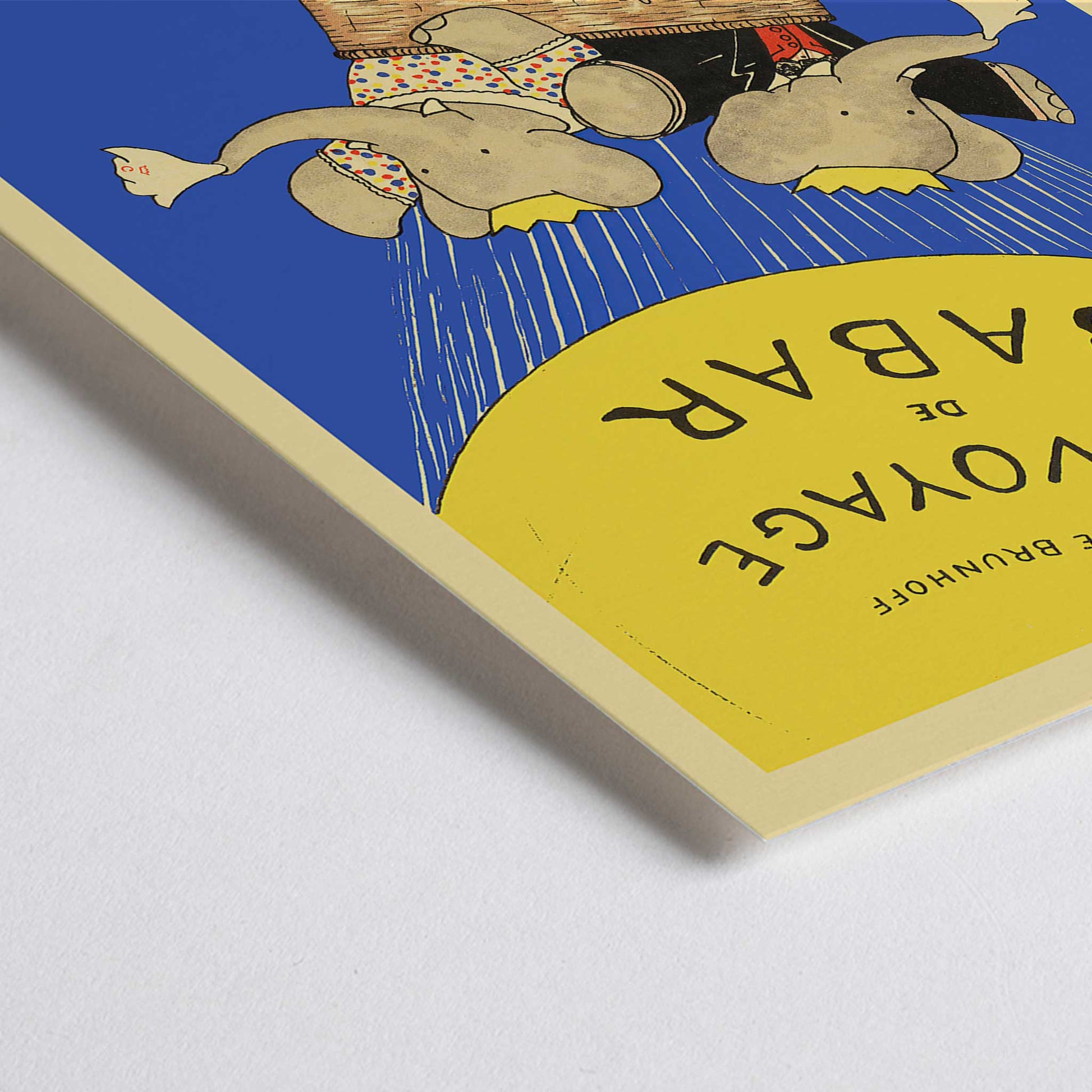 Closeup detail of Le Voyage de Babar by Jean de Brunhoff illustration and poster featuring elephants in a hot air balloon with a yellow balloon on a blue background