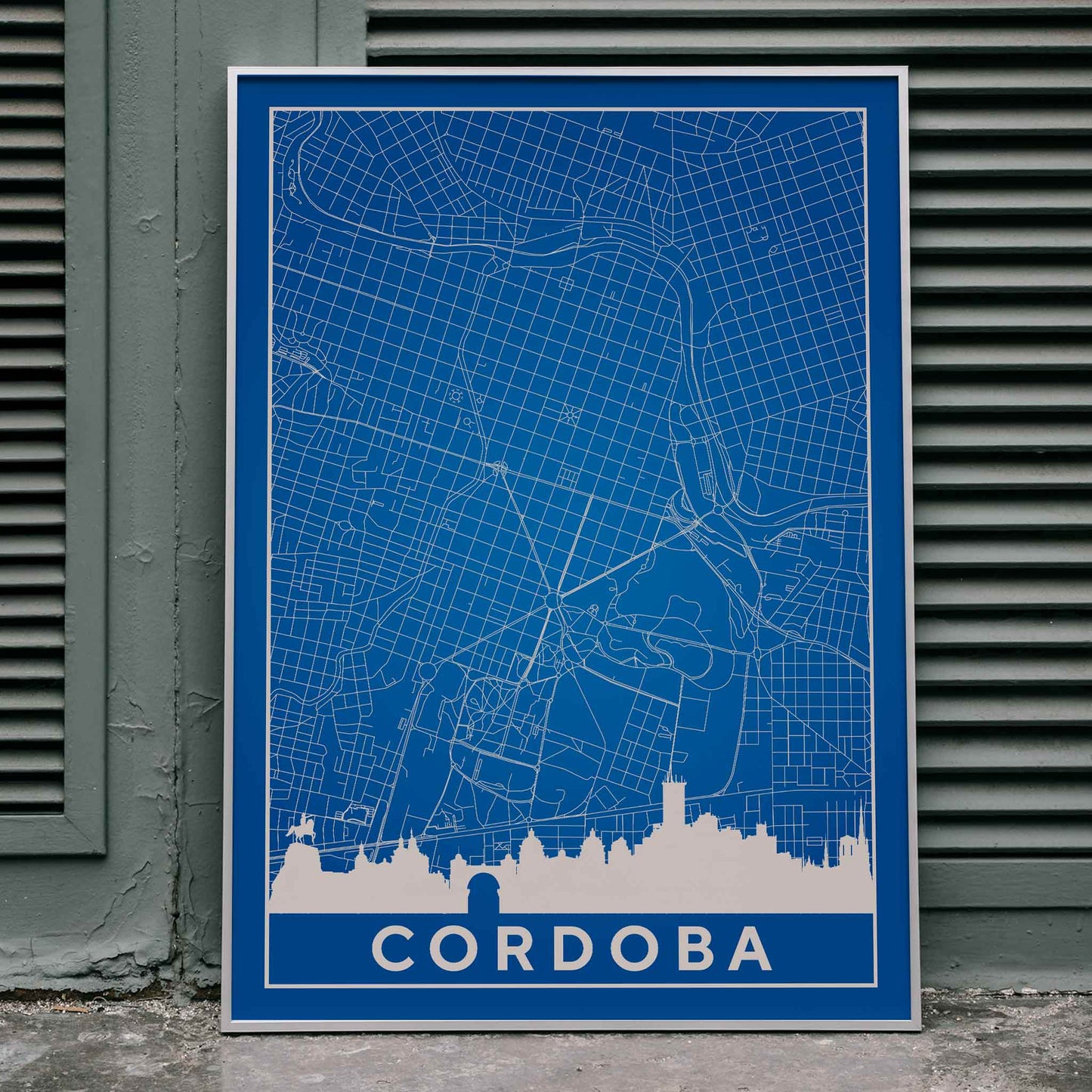 Cordoba Minimalist Map artwork and poster with blue and white grid design and city skyline silhouette, framed and displayed in home decor