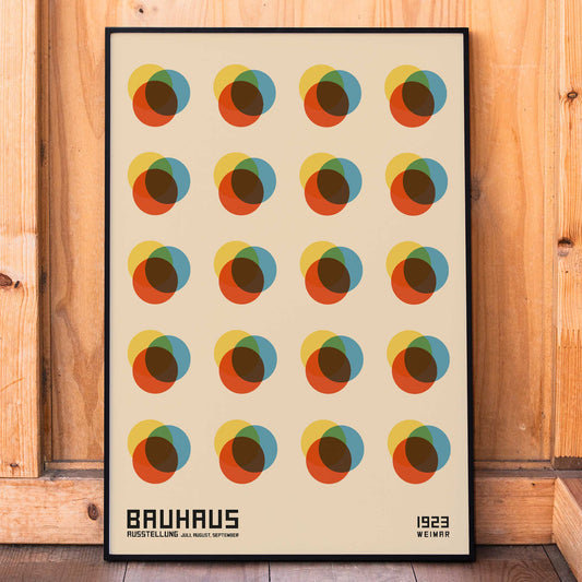 Bauhaus Poster 8 Inspired by the Weimar Exhibition with abstract colorful overlapping circles in a geometric grid pattern, framed and displayed in home decor