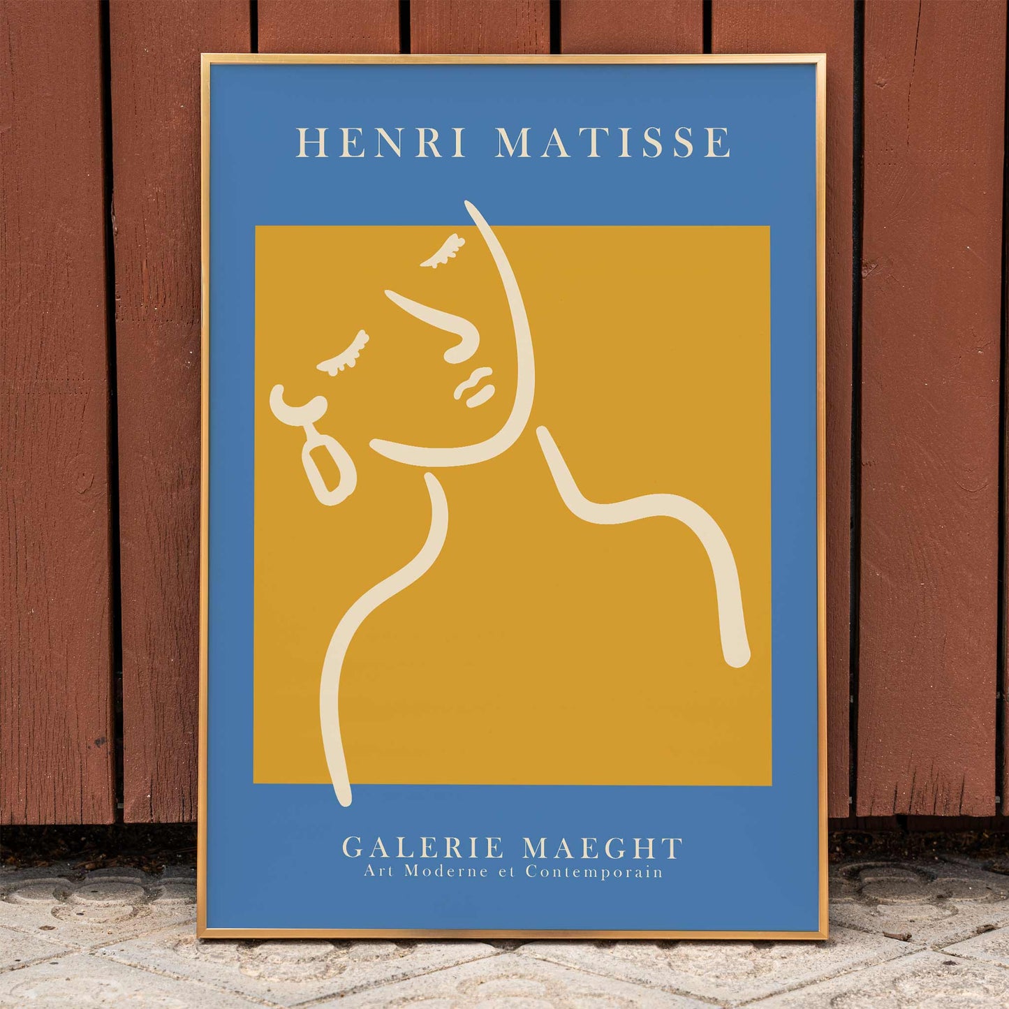 Henri Matisse poster of abstract girl with earring in orange and blue from Galerie Maeght artwork, framed and displayed in home decor