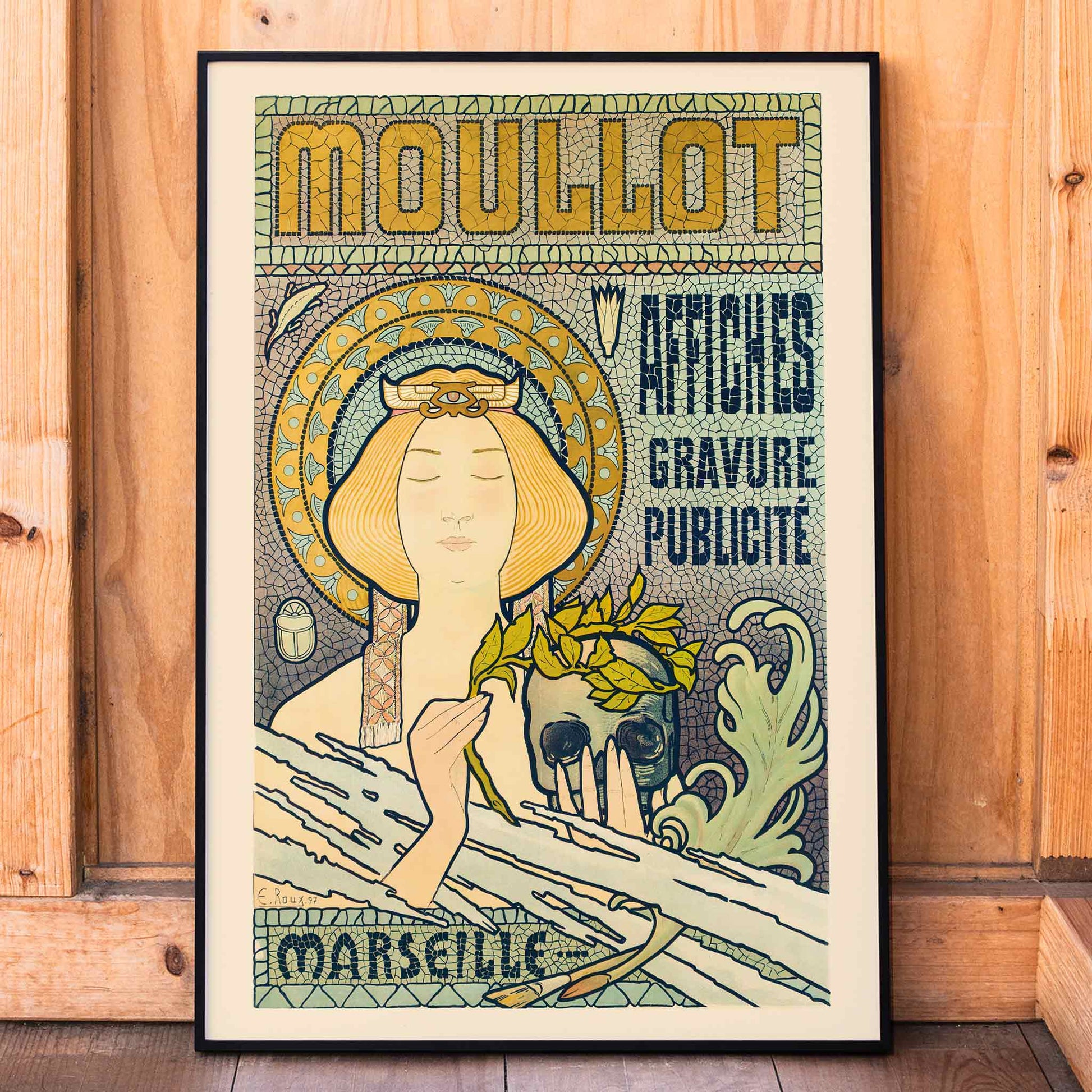 Art Nouveau poster Moullot Marseille by E Roux showing a serene woman with a floral headpiece holding foliage against a decorative background, framed and displayed in home decor