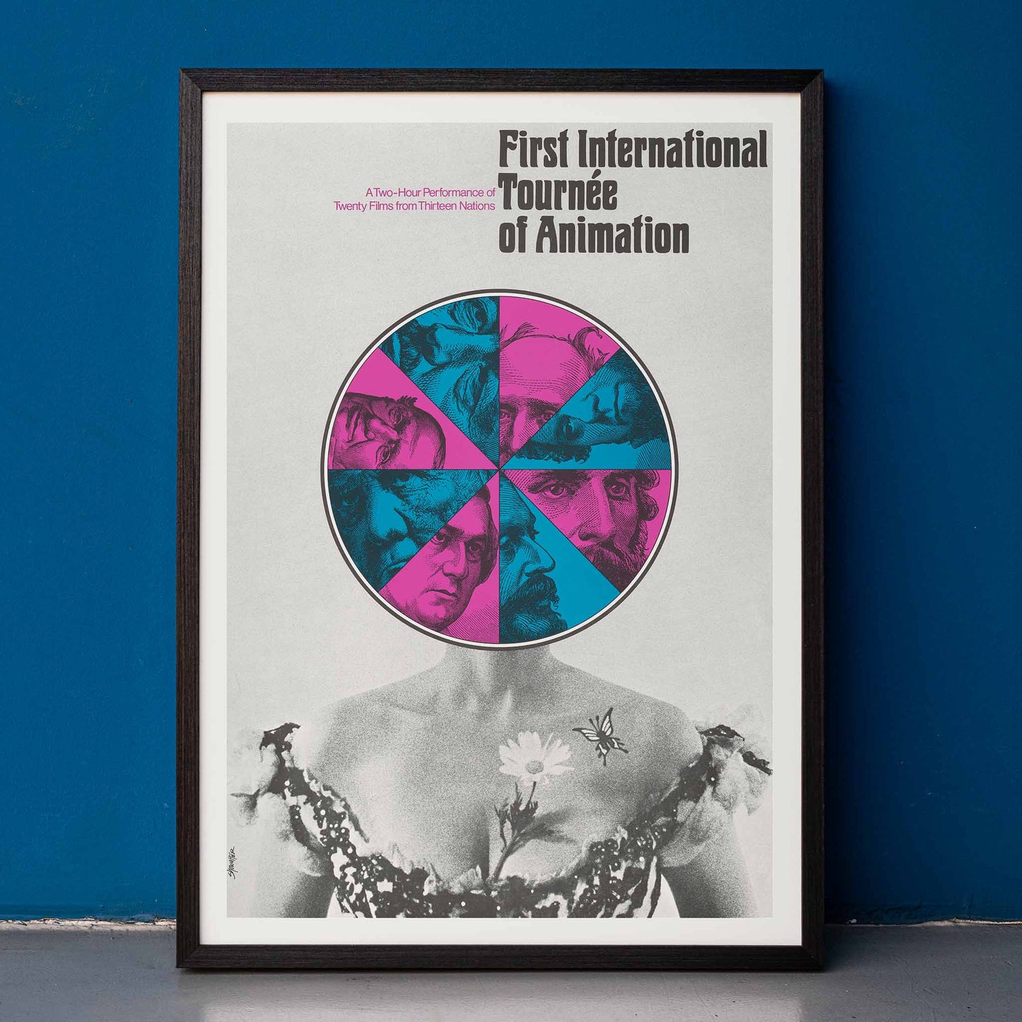 Poster for First International Tournee of Animation by Paul Showalter with abstract faces colorful geometric graphic and grayscale torso, framed and displayed in home decor
