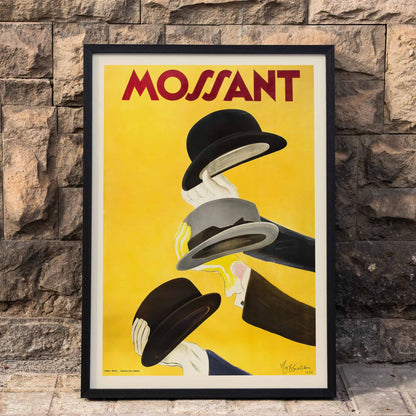 Vibrant poster by Leonetto Cappiello featuring three hands holding hats with yellow background and Mossant text, framed and displayed in home decor