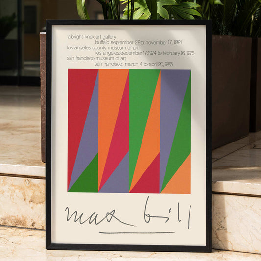 Colorful geometric design and shapes by Max Bill on serigraph silkscreen exhibition poster titled Serigraph Silkscreen with signature in black frame, framed and displayed in home decor