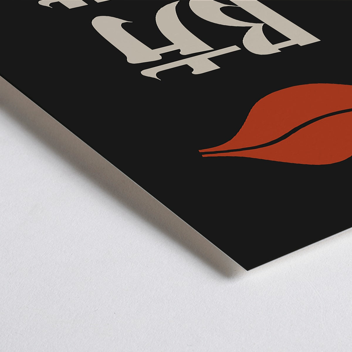 Closeup detail of Red Lips by Ikko Tanaka minimalist poster with bold red lips and Japanese characters on black background