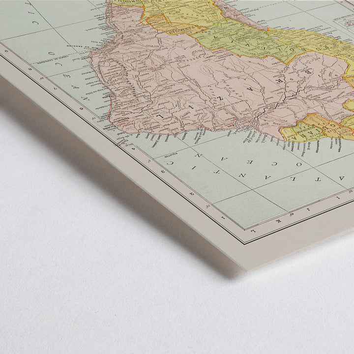 Closeup detail of Vintage Rand McNally South America map poster with labeled continent in soft yellow pink and beige cartographic detail