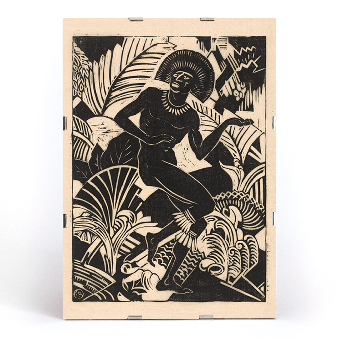 Black and white artwork and poster of a stylized dancing figure among bold jungle plants by Henri van der Stok Jager, framed and displayed in modern living room decor